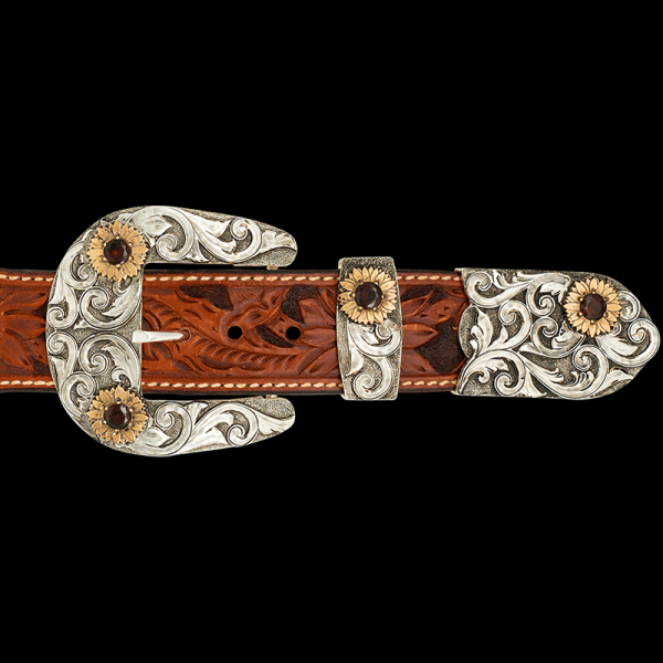 The beautiful Yellowstone Three Piece Buckle  Set captures the essence of the American West!  Featuring hand matted base with silver scrollwork and bronze customizable sunflowers. This is the perfect gift for any cowgirl!